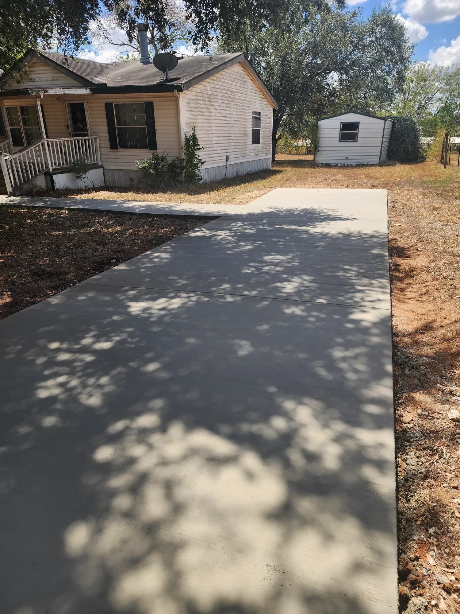 Completed concrete walkway installed by Sanders & Co in San Antonio